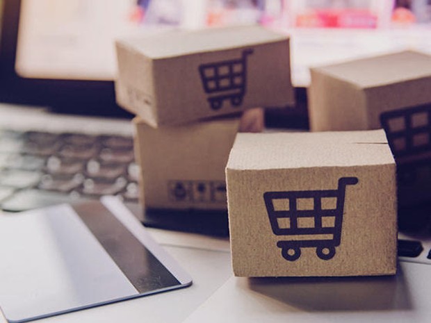 laptop creditcard pakketjes winkelwagen